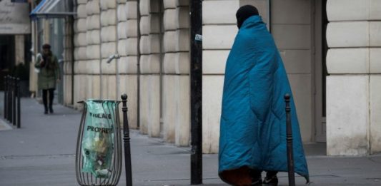 a homeless man in Paris