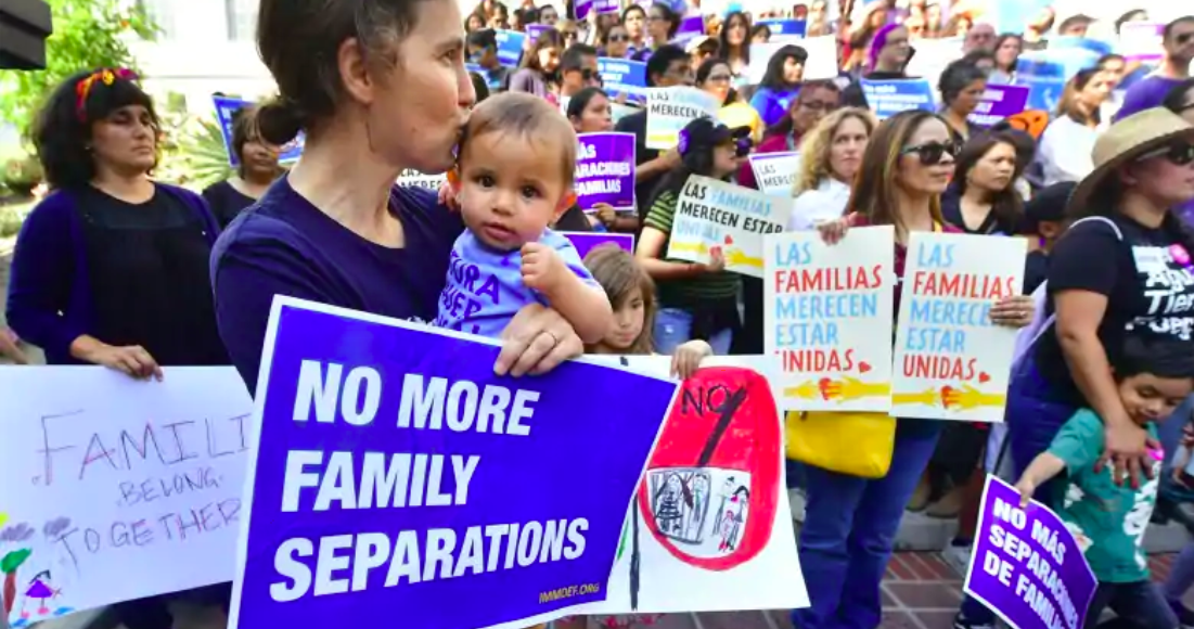 People gather on the steps of Los Angeles City Hall on Thursday to protest the federal government's policy of separating children from their parents trying to cross the U.S.-Mexico border illegally.
