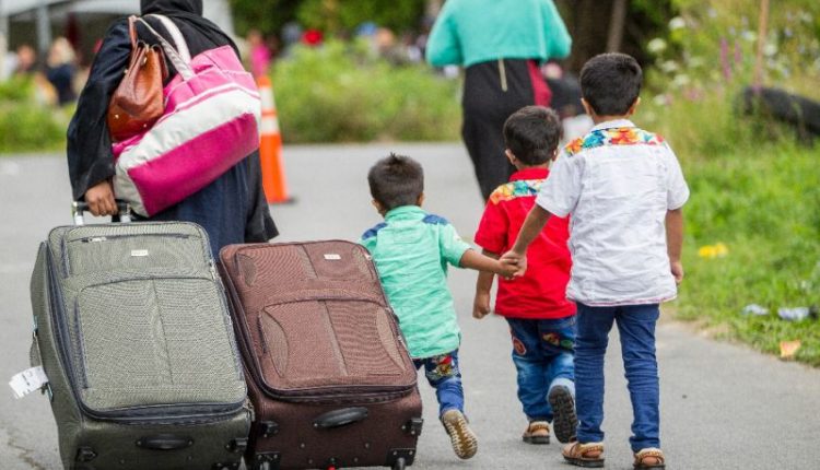 A family of asylum seekers heading towards the US-Canada border
