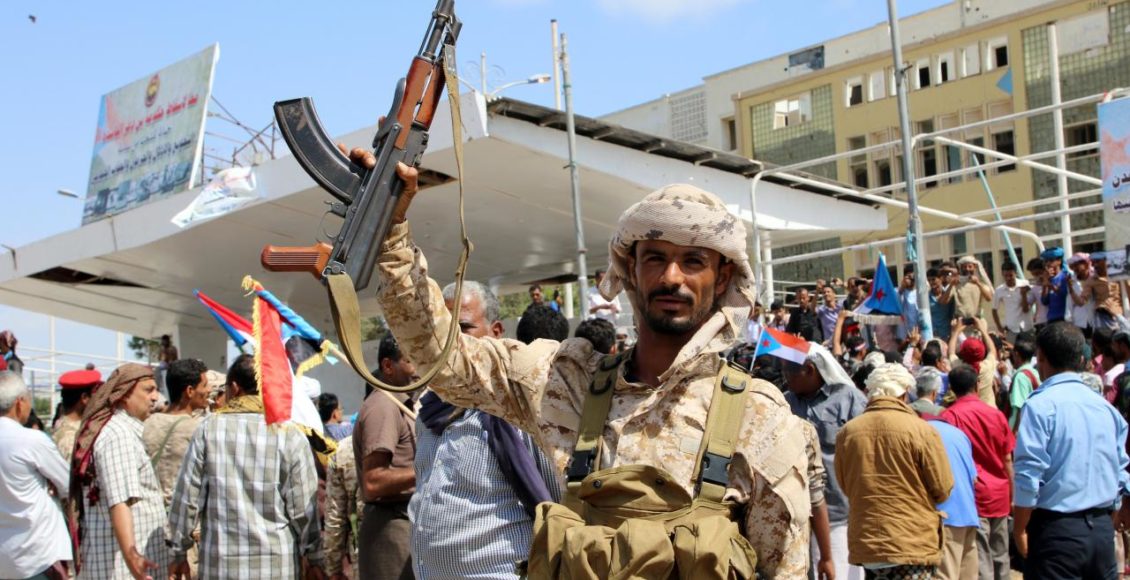 A southern Yemeni separatist fighter waves his rifle at the site of an anti-government protest in the port city of Aden, Yemen January 30, 2018.