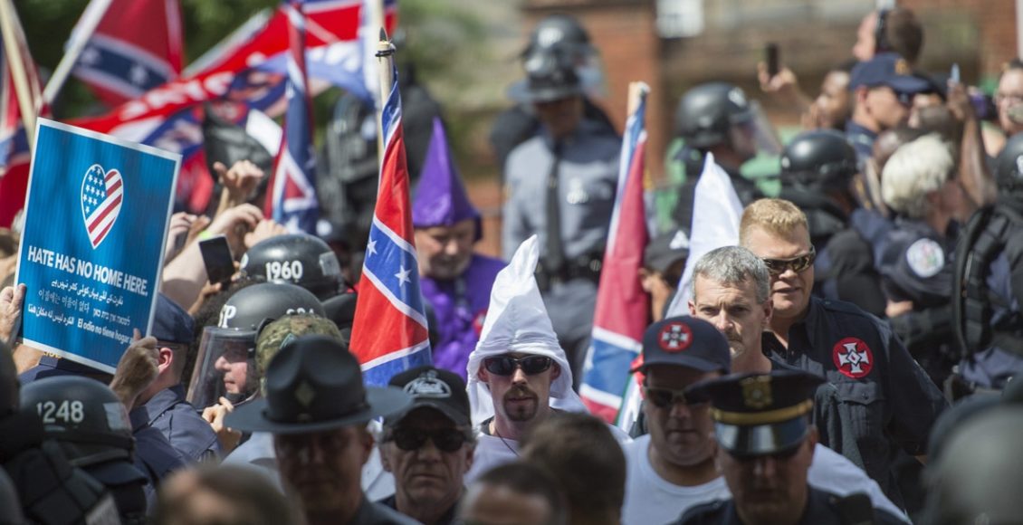 Members of the Ku Klux Klan arrive for a rally in Charlottesville, Virginia, on July 8