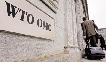 A men enters the WTO building