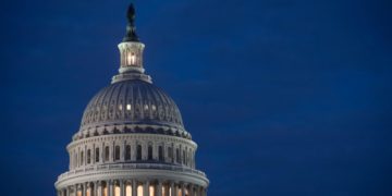 The U.S. Capitol building is seen at dusk in Washington, DC