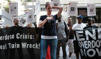Sarah Wilson joins other recovering drug users, activists and social service providers at a rally calling for "bolder political action" in combating the overdose epidemic on August 17, 2017 in New York City