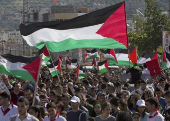 Arab Israelis with Palestinian flags