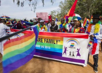 Demonstrators march in an LGBT pride parade in Uganda.