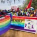 Demonstrators march in an LGBT pride parade in Uganda.