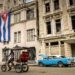 A Cuban street with a flag