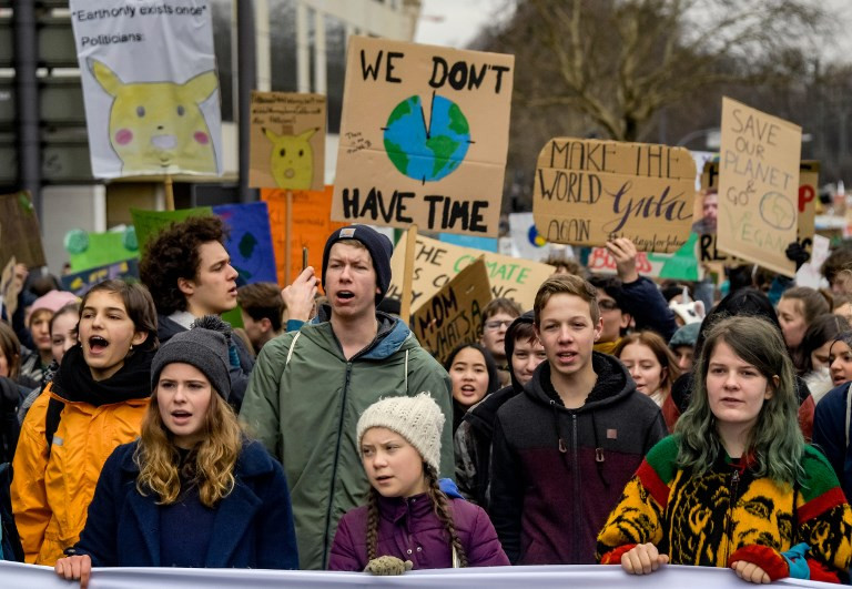 Youth activists protest for climate action, lead by Swedish activist Greta Thunberg.