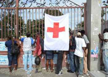 Haitians outside a Red Cross field hospital in Carrefour, Haiti