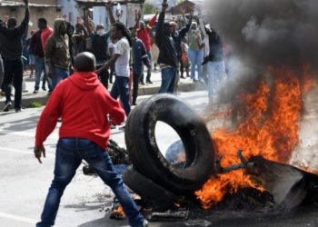 South African burning tires in protests that led to xenophobic violence