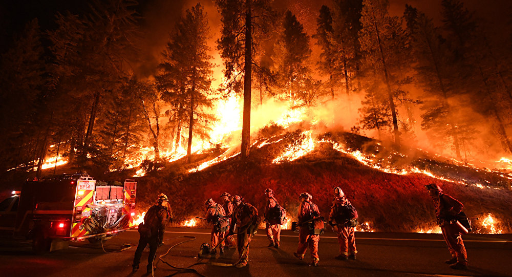 Firefighters battle the Camp Fire in Northern California, November 2019.