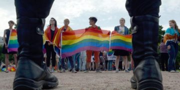People wave LGBTI rights' movement rainbow flags during the gay pride rally in Saint Petersburg