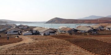 Farms and farm houses near the River Taedong, North Korea.