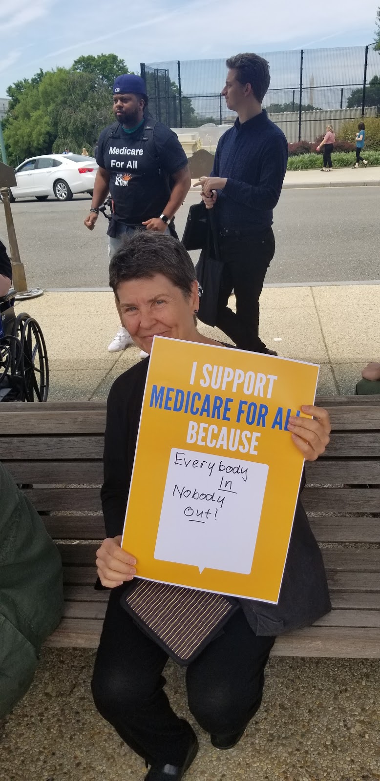 Medicare for All supporter with a sign
