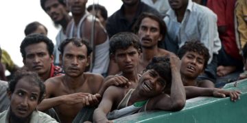 Rohingya migrants in a boat adrift in the Andaman Sea