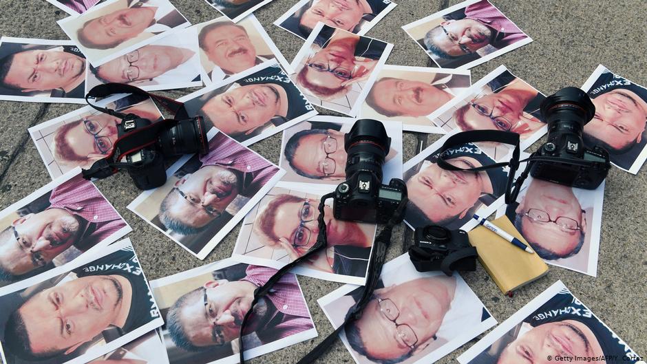 Cameras and photos of journalists killed across Mexico are placed on the ground during a protest on May 15, 2017, in Mexico City