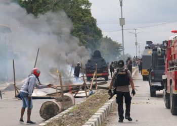 Indonesian officials confront protesters in Timika city in the restive Papua province