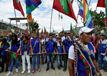 Indigenous people walk through Toribio, Cauca department, Colombia, to attend the National Meeting of Indigenous Guards. Photo: AFP