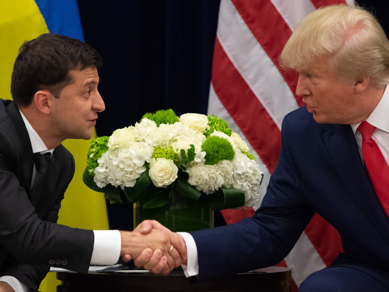 President Donald Trump and Ukrainian President Volodymyr Zelensky shake hands during a meeting in New York on September 25, 2019