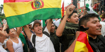 People take to the streets of Santa Cruz to celebrate the resignation of Bolivian President Evo Morales on November 10 after weeks of protests