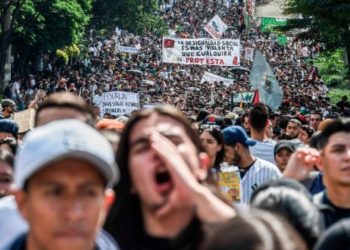 Colombians march during a nationwide strike against the government's austerity policies, November 21, 2019. Photo: AFP