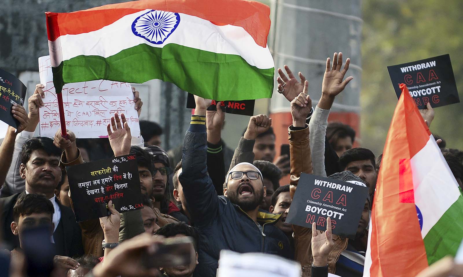 Protesters shout slogans during a demonstration against India's new citizenship law in Allahabad on December 19, 2019