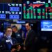 Traders work after the closing bell at the New York Stock Exchange (NYSE) on August 7, 2019 on Wall Street in New York City.