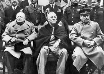 British Prime Minister Winston Churchill (L), US President Franklin Roosevelt (C), and Soviet Union Leader Joseph Stalin (R) pose at the start of the Conference of the Allied powers in Yalta, Crimea, in 1945