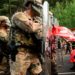 The National Guard confronts protestors