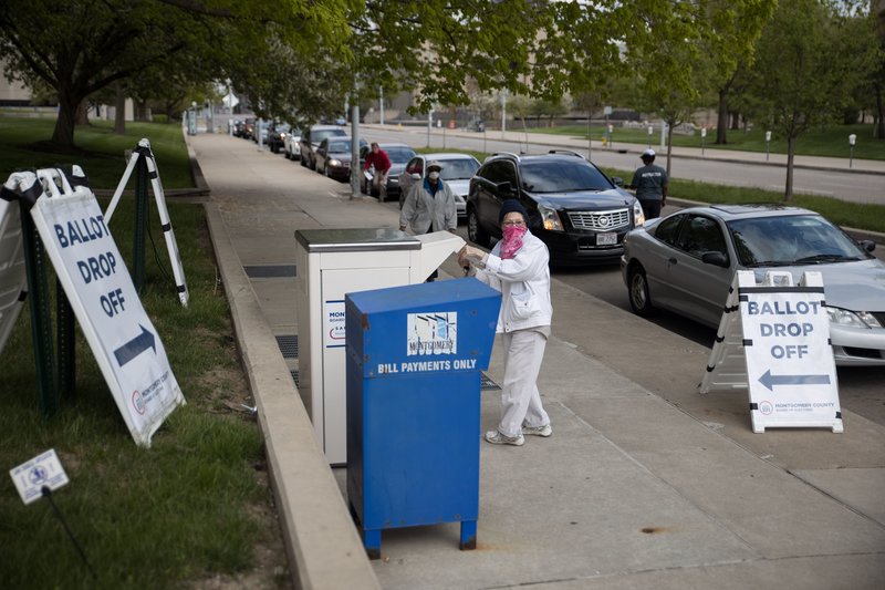 Ohio voters drop off their ballots in the state's primary election in April. Photo: Megan Jelinger/AFP.
