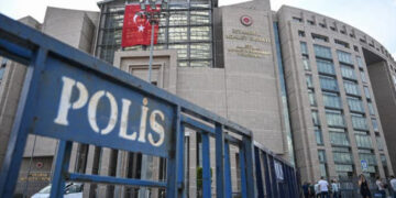 A "police" sign in front of the Istanbul courthouse.