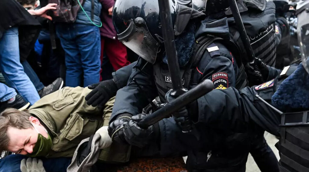 Russian police arresting protesters in Moscow as they demonstrate in support of Alexey Navalny.