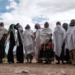 Women mourn the victims of a massacre allegedly perpetrated by Eritrean soldiers in the village of Dengolat in the capital of Tigray,