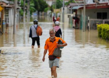 A flooded road in Batu Berendam in Malaysia's southern coastal state of Malacca