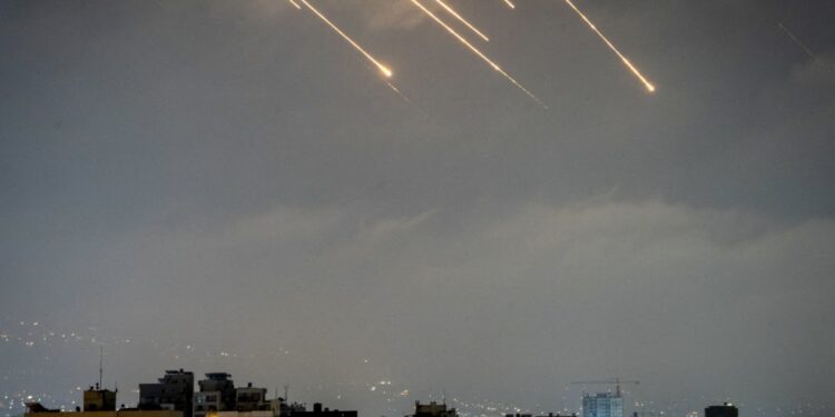 Iranian missiles and Israeli interceptors light up the sky over Beirut, Lebanon, on June 14, 2025. Iran launched multiple missiles toward Israeli targets, triggering interception attempts above several regional capitals, including Beirut.