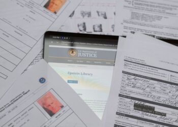 Printed copies of documents released by the U.S. Justice Department in connection with court cases involving the late financier and convicted sex offender Jeffrey Epstein.