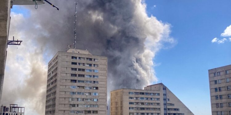 Plumes of smoke rise following reported explosions in Tehran on March 1, 2026, after Iran's supreme leader, Ayatollah Ali Khamenei, was killed a day earlier in a large US and Israeli attack, prompting a new wave of retaliatory missile strikes from Iran.
