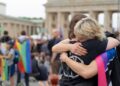 Germany, Berlin, 26 july 2026, Gathering in tribute to the victims and all those affected by the attack on the 2026 CSD (Christopher Street Day/Pride) event, held at Pariser Platz.