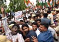 Protesters gathered to condemn the detention of opposition leader of parliament, Rahul Gandhi, during a protest in New Delhi.