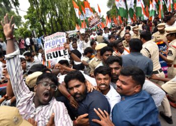 Protesters gathered to condemn the detention of opposition leader of parliament, Rahul Gandhi, during a protest in New Delhi.